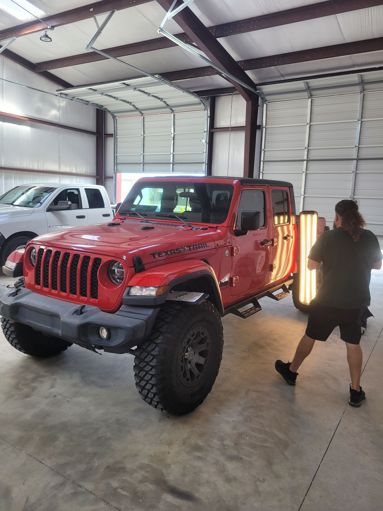 Technician working on a Jeep Gladiator in the shop